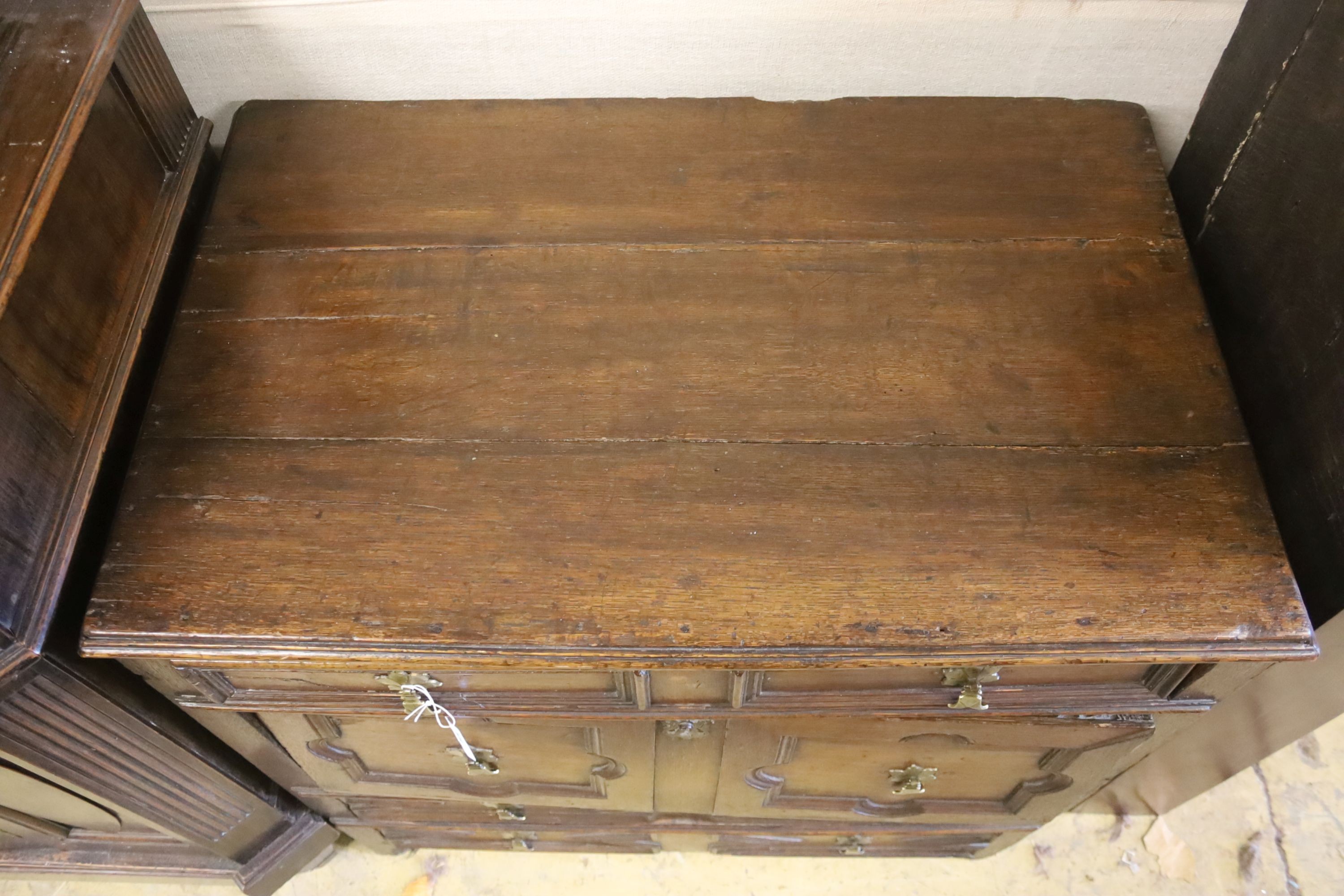 An 18th century oak chest of drawers (with original receipt), width 84cm, depth 53cm, height 82cm